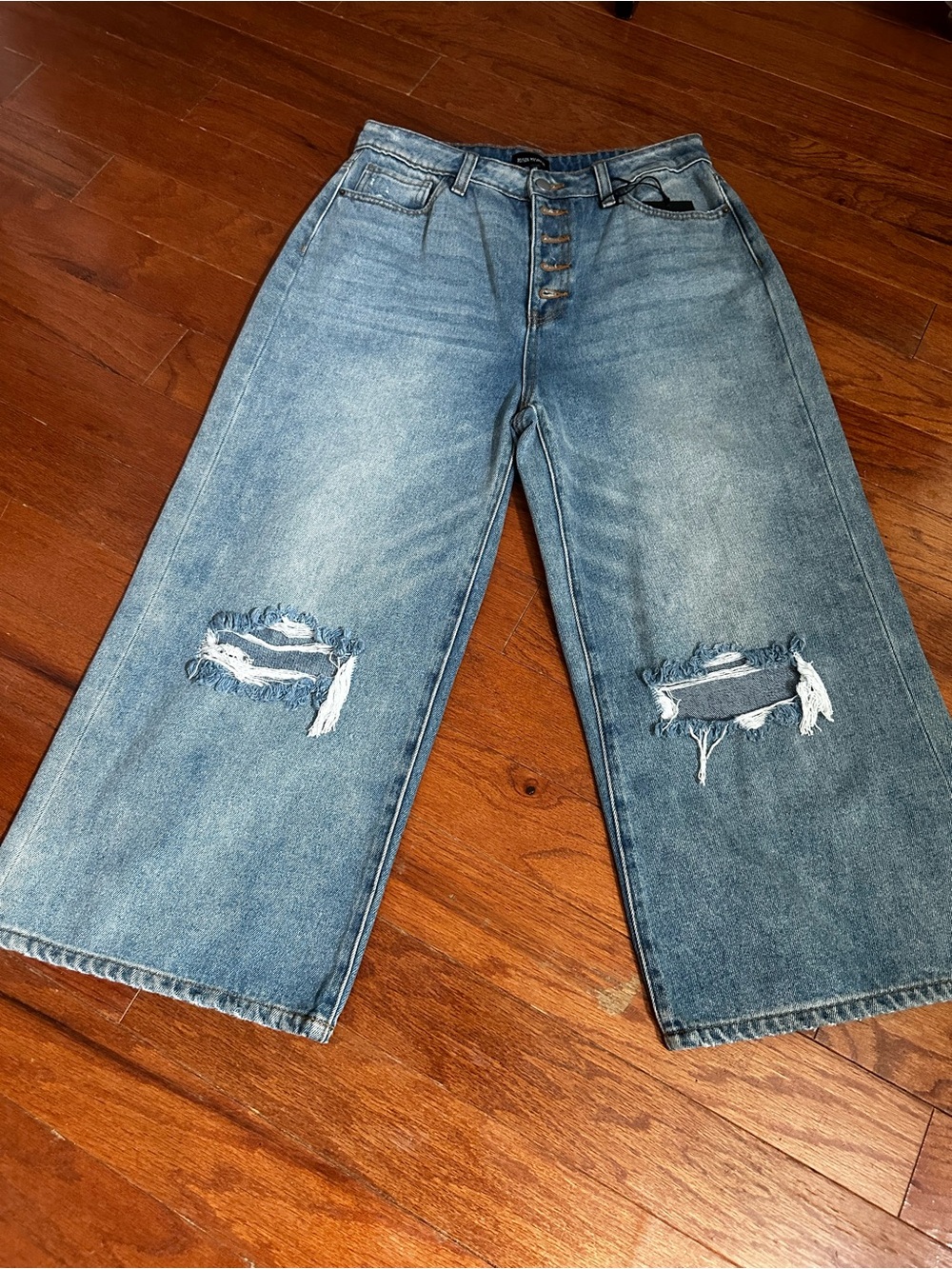 High-Rise Wide-Leg Distressed Jeans in Light Blue